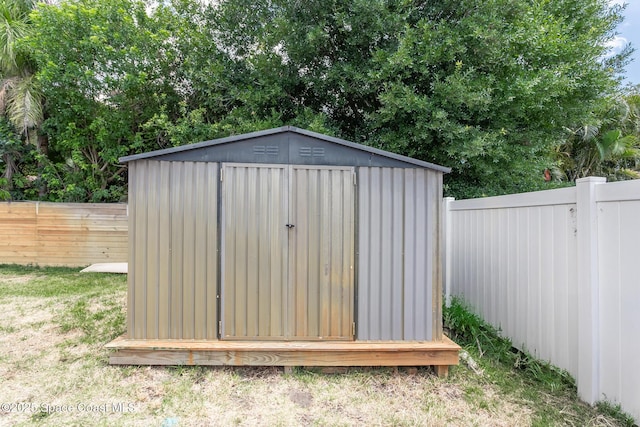 4920 48th Pl, Vero Beach, FL 32967 - view of shed featuring a fenced backyard