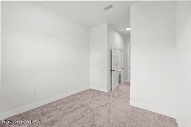 998 Wacona St SE, Palm Bay, FL 32909 - empty room featuring carpet flooring and baseboards