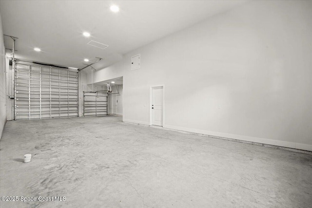 998 Wacona St SE, Palm Bay, FL 32909 - garage with recessed lighting and baseboards