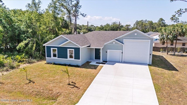 998 Wacona St SE, Palm Bay, FL 32909 - single story home featuring an attached garage, a front lawn, driveway, roof with shingles, and stucco siding