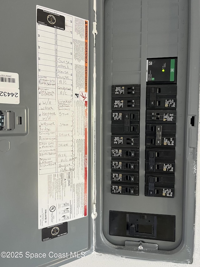 113 Harbor Dr, Cape Canaveral, FL 32920 - utility room featuring electric panel