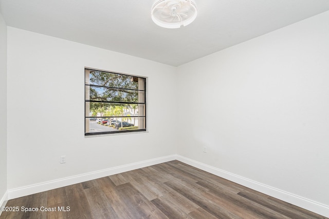 113 Harbor Dr, Cape Canaveral, FL 32920 - empty room with wood finished floors and baseboards