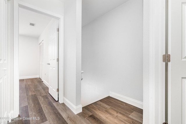 113 Harbor Dr, Cape Canaveral, FL 32920 - hall featuring dark wood finished floors