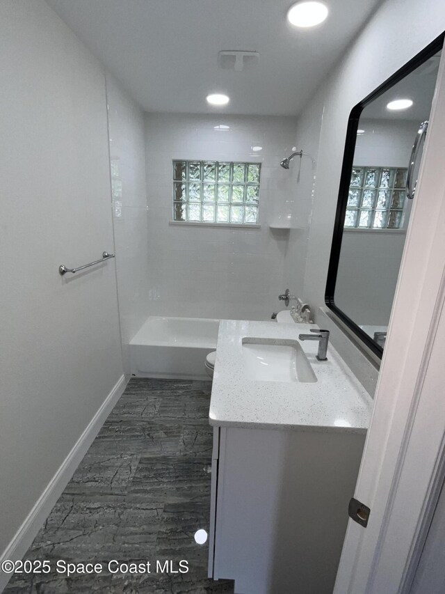113 Harbor Dr, Cape Canaveral, FL 32920 - bathroom featuring vanity, shower / bath combination, and recessed lighting