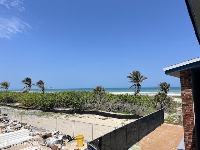 22 Tulip Ave Unit 330, Cocoa Beach, FL 32931 - water view featuring fence and local beach