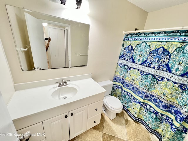 22 Tulip Ave Unit 330, Cocoa Beach, FL 32931 - full bathroom with vanity, curtained shower, and stone finish flooring