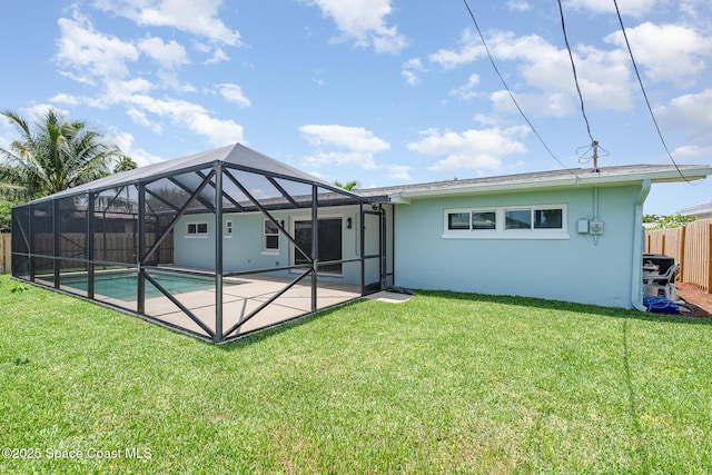 225 Price Ct, Satellite Beach, FL 32937 - back of property with stucco siding, a patio, and a lanai