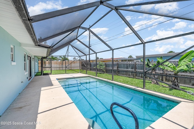 225 Price Ct, Satellite Beach, FL 32937 - view of swimming pool featuring glass enclosure and a patio area