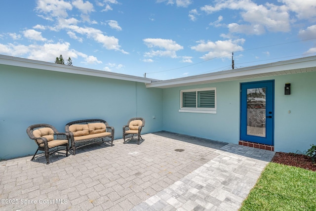 225 Price Ct, Satellite Beach, FL 32937 - view of patio featuring outdoor lounge area