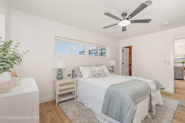 225 Price Ct, Satellite Beach, FL 32937 - bedroom featuring light wood-style floors, baseboards, and ceiling fan