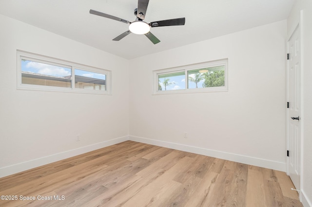 225 Price Ct, Satellite Beach, FL 32937 - spare room with baseboards, light wood-type flooring, and a ceiling fan