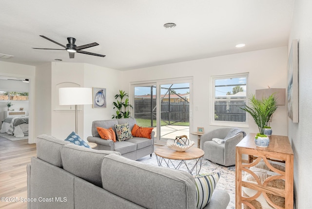 225 Price Ct, Satellite Beach, FL 32937 - living area featuring light wood-style flooring and a ceiling fan