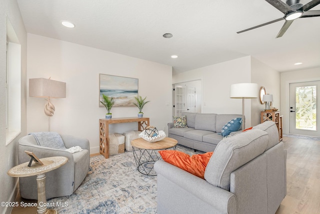 225 Price Ct, Satellite Beach, FL 32937 - living area featuring a ceiling fan, light wood-style flooring, baseboards, and recessed lighting