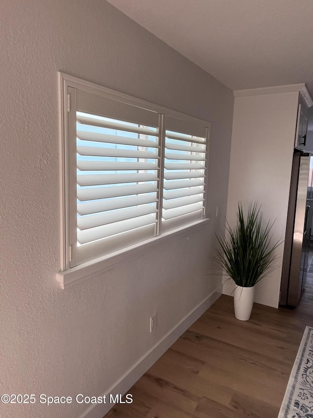 225 Price Ct, Satellite Beach, FL 32937 - detailed view of wood finished floors and baseboards