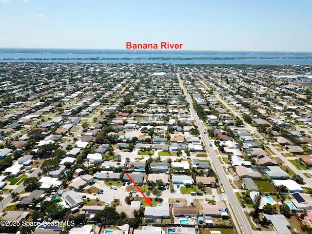 225 Price Ct, Satellite Beach, FL 32937 - aerial overview of property's location with a nearby body of water and nearby suburban area