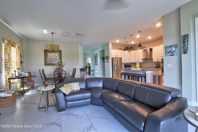 2242 Great Belt Cir, Melbourne, FL 32940 - living room with light marble finish flooring