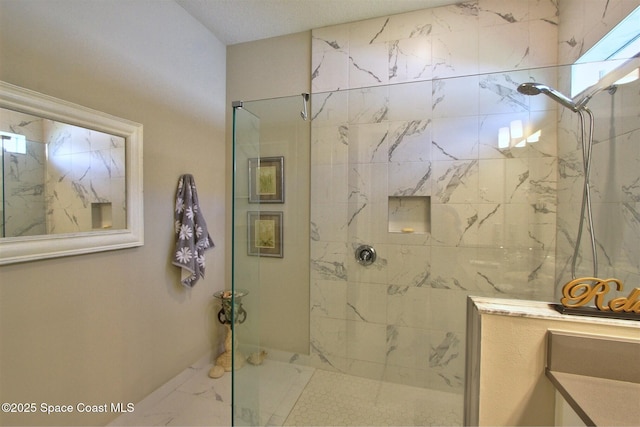 2242 Great Belt Cir, Melbourne, FL 32940 - bathroom with marble look tiles and a marble finish shower