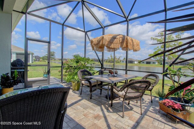 2242 Great Belt Cir, Melbourne, FL 32940 - sunroom with outdoor dining area and a water view