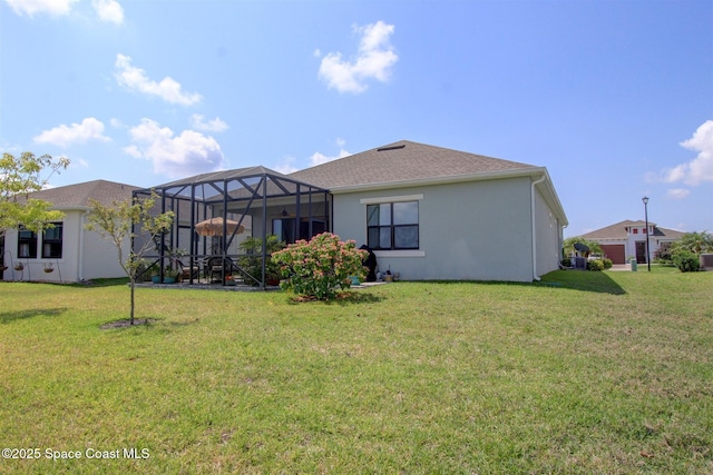 2242 Great Belt Cir, Melbourne, FL 32940 - back of property featuring a lawn, stucco siding, and a lanai