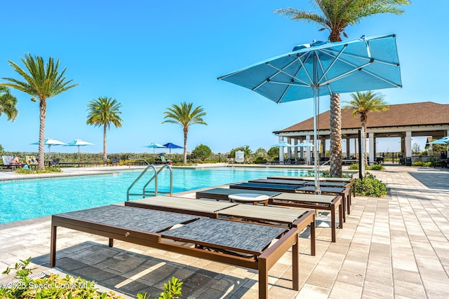 2242 Great Belt Cir, Melbourne, FL 32940 - community pool with a patio area