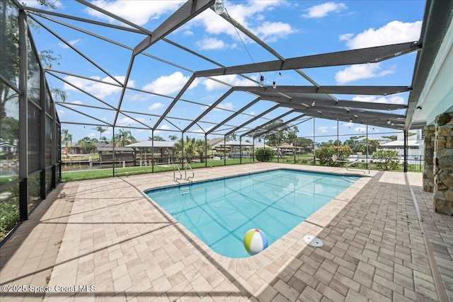 6345 Anchor Ln, Rockledge, FL 32955 - outdoor pool featuring a patio and a lanai