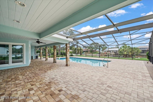 6345 Anchor Ln, Rockledge, FL 32955 - swimming pool with a patio area, ceiling fan, and glass enclosure