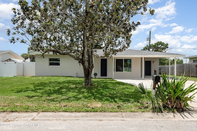 878 Iroquois Ave, Melbourne, FL 32935 - view of front facade with stucco siding