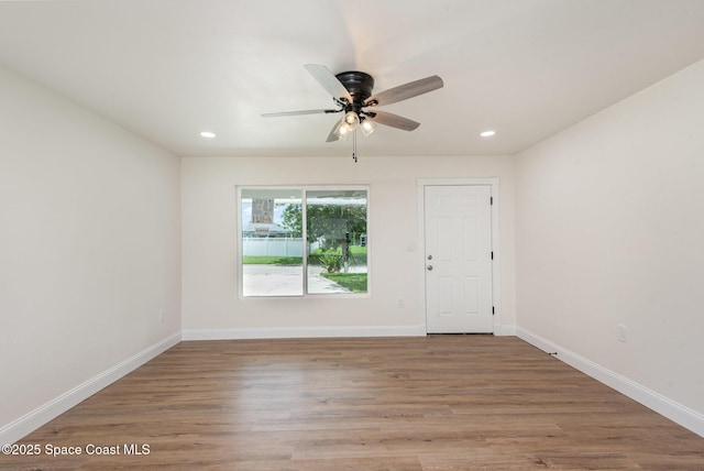 878 Iroquois Ave, Melbourne, FL 32935 - unfurnished room featuring a ceiling fan, wood finished floors, recessed lighting, and baseboards