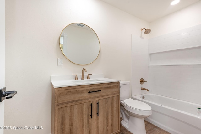 878 Iroquois Ave, Melbourne, FL 32935 - bathroom featuring vanity, shower / washtub combination, toilet, and wood finished floors