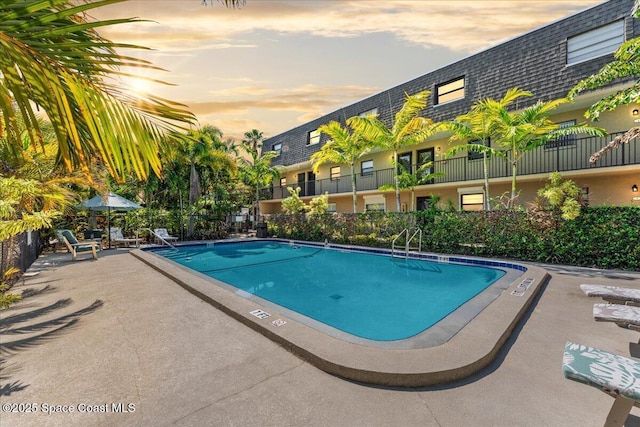community pool with a patio