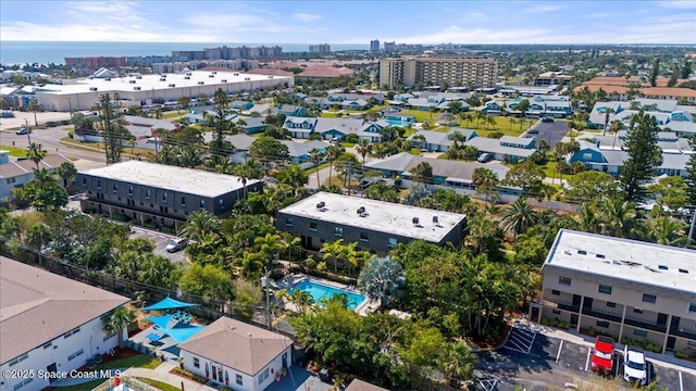 view of urban area featuring a pool area