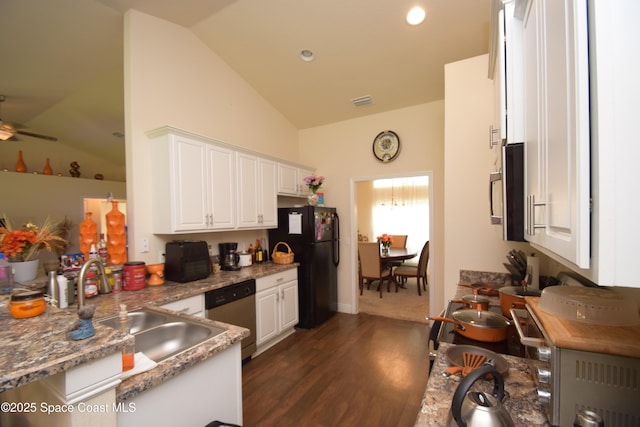 kitchen featuring stainless steel dishwasher, freestanding refrigerator, white cabinetry, dark wood-type flooring, and high vaulted ceiling
