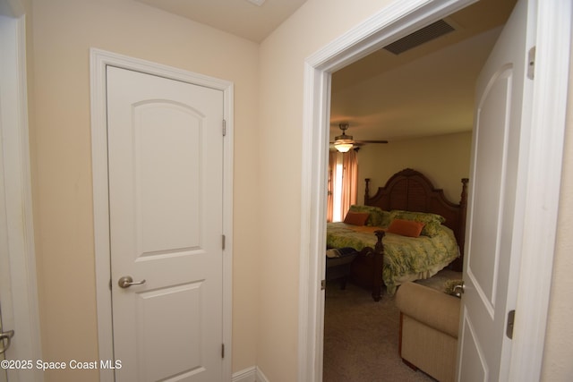 bedroom featuring carpet