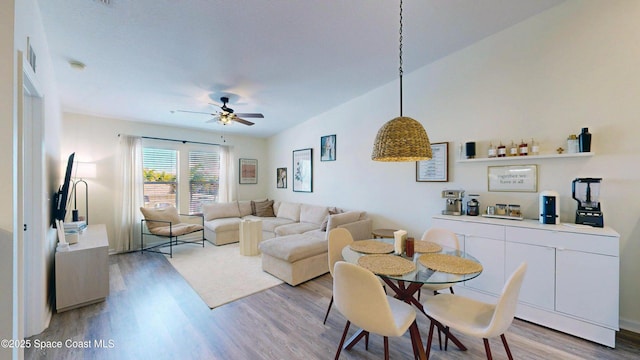 4047 Meander Pl Unit 205, Rockledge, FL 32955 - dining space featuring light wood-type flooring and a ceiling fan