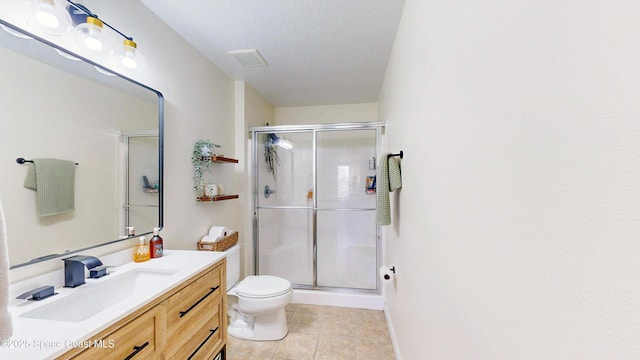 4047 Meander Pl Unit 205, Rockledge, FL 32955 - full bathroom featuring a stall shower, tile patterned flooring, vanity, and toilet
