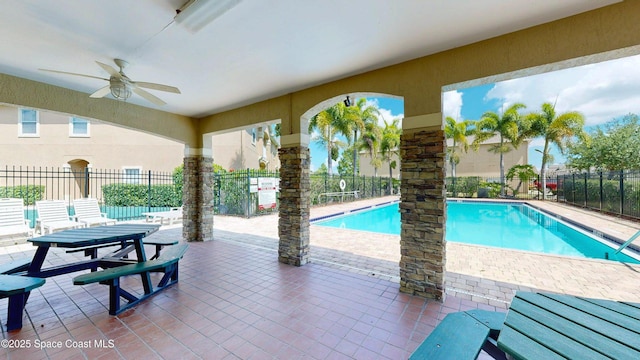 4047 Meander Pl Unit 205, Rockledge, FL 32955 - community pool with fence, ceiling fan, and a patio area