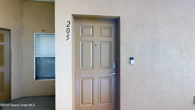 4047 Meander Pl Unit 205, Rockledge, FL 32955 - entrance to property with stucco siding