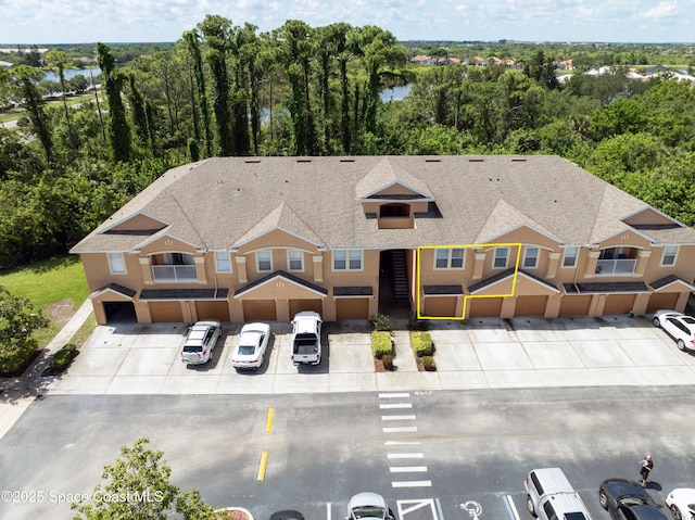 4047 Meander Pl Unit 205, Rockledge, FL 32955 - view of front facade featuring uncovered parking