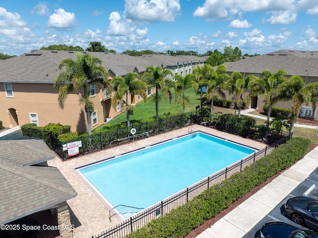 4047 Meander Pl Unit 205, Rockledge, FL 32955 - community pool with fence and a residential view