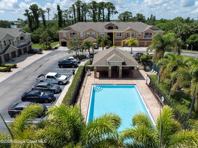 4047 Meander Pl Unit 205, Rockledge, FL 32955 - view of pool with fence and a residential view