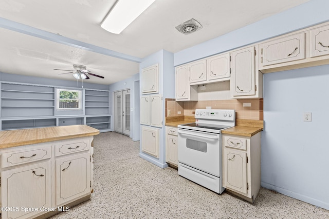 kitchen with electric stove, a ceiling fan, decorative backsplash, light countertops, and baseboards