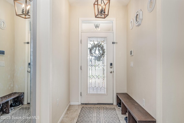 4109 Alligator Flag Cir, West Melbourne, FL 32904 - foyer featuring a chandelier and baseboards