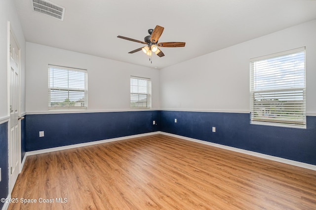 4109 Alligator Flag Cir, West Melbourne, FL 32904 - unfurnished room featuring wood finished floors, a ceiling fan, and baseboards