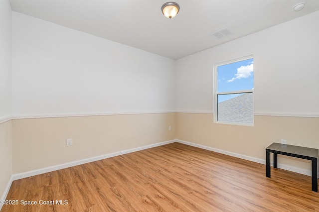 4109 Alligator Flag Cir, West Melbourne, FL 32904 - spare room featuring light wood-style floors, baseboards, and a smoke detector