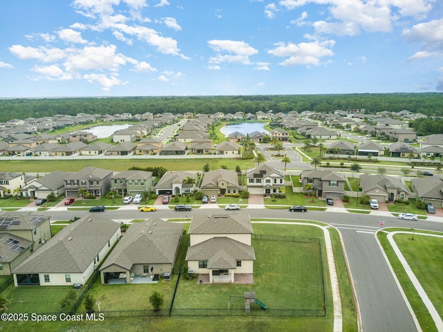 4109 Alligator Flag Cir, West Melbourne, FL 32904 - aerial perspective of suburban area with a nearby body of water