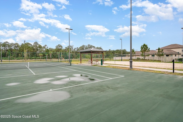 4109 Alligator Flag Cir, West Melbourne, FL 32904 - view of tennis court with a gazebo and community basketball court