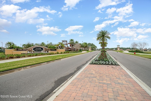 4109 Alligator Flag Cir, West Melbourne, FL 32904 - view of asphalt street featuring sidewalks and curbs