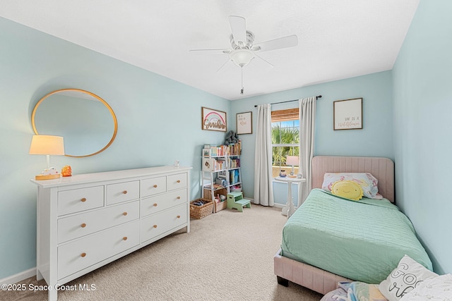 2650 Revolution St Unit 103, Melbourne, FL 32935 - bedroom with light colored carpet, baseboards, and a ceiling fan