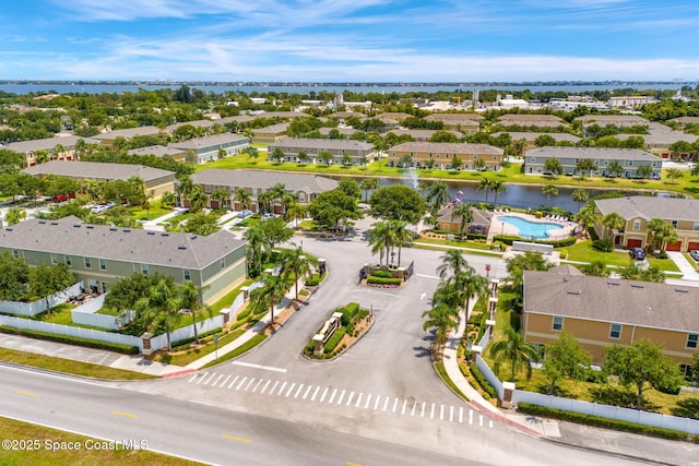 2650 Revolution St Unit 103, Melbourne, FL 32935 - aerial view of residential area featuring a pool and a nearby body of water