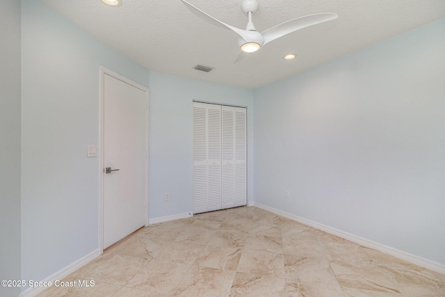 unfurnished bedroom featuring a closet, recessed lighting, and ceiling fan